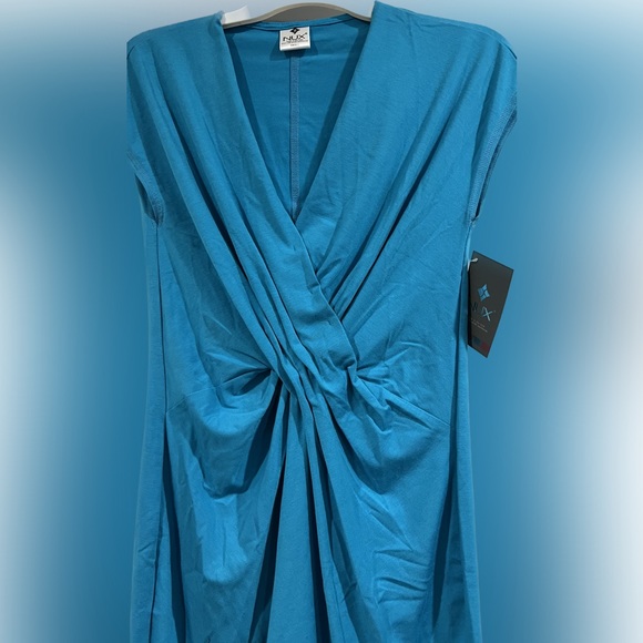 NUX Dresses & Skirts - NUX Twist Dress super cute!!